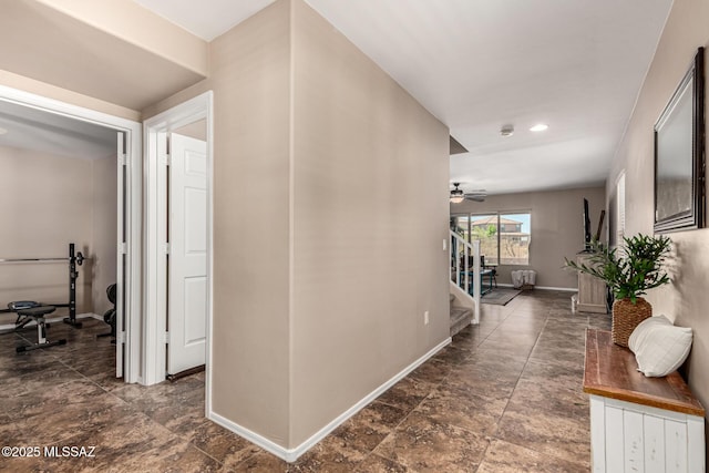 9528 S Desert Fauna Loop, Tucson, AZ 85747 - hall featuring baseboards, recessed lighting, stairway, and stone finish flooring