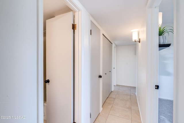 2826 W Jacinto St, Tucson, AZ 85745 - corridor with light tile patterned flooring and baseboards