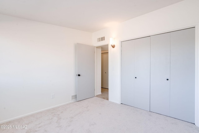 2826 W Jacinto St, Tucson, AZ 85745 - unfurnished bedroom with carpet floors, a closet, and baseboards