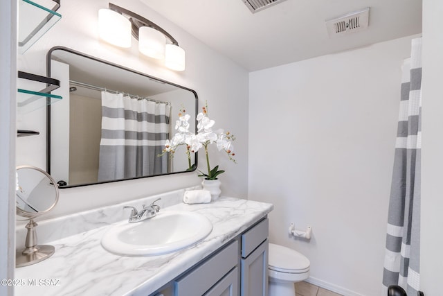 2826 W Jacinto St, Tucson, AZ 85745 - bathroom featuring toilet, vanity, tile patterned flooring, and a shower with shower curtain