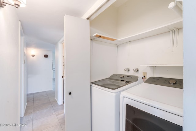 2826 W Jacinto St, Tucson, AZ 85745 - clothes washing area featuring washing machine and clothes dryer and light tile patterned floors