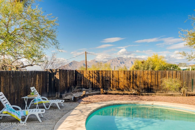 2826 W Jacinto St, Tucson, AZ 85745 - view of pool featuring a fenced backyard and a mountain view