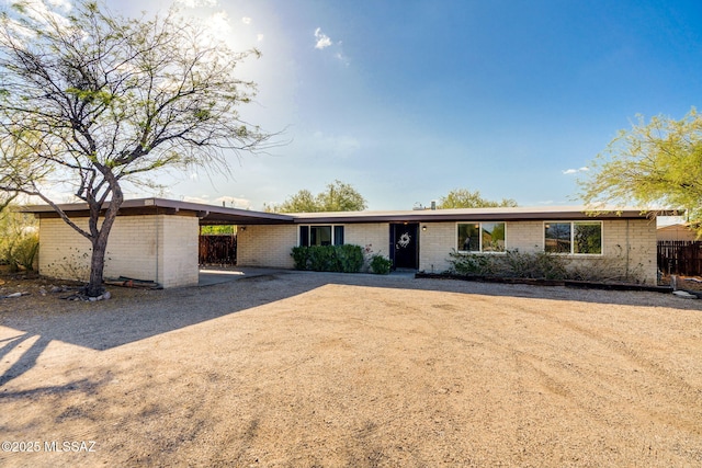 2826 W Jacinto St, Tucson, AZ 85745 - view of front of home featuring brick siding and fence
