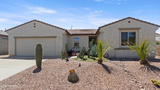 12693 N Rye Dr, Marana, AZ 85653 - view of front facade featuring stucco siding, an attached garage, concrete driveway, and a tile roof