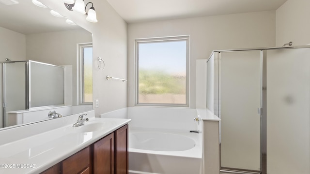 12693 N Rye Dr, Marana, AZ 85653 - full bathroom featuring a garden tub, a stall shower, and vanity