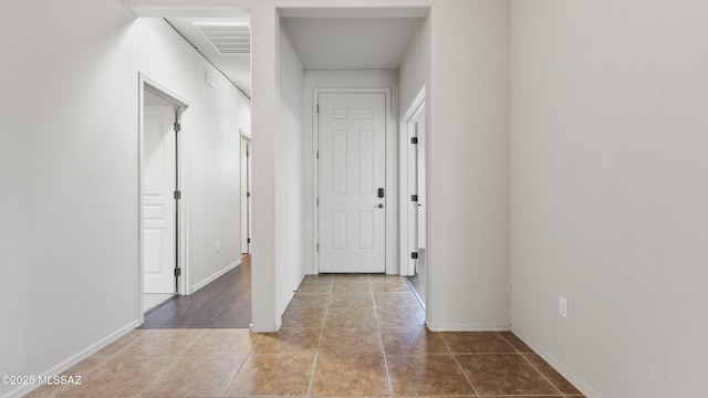 12693 N Rye Dr, Marana, AZ 85653 - corridor with tile patterned floors and baseboards
