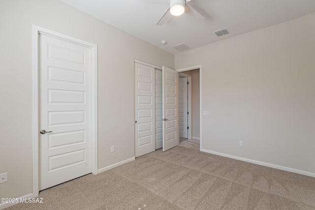435 E Day Flower Dr, Tucson, AZ 85755 - unfurnished bedroom featuring carpet floors and a ceiling fan