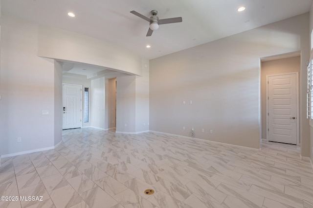 435 E Day Flower Dr, Tucson, AZ 85755 - unfurnished room featuring a ceiling fan, light marble finish floors, and recessed lighting