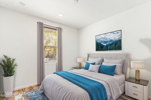 10394 S Cienega Knolls Loop, Vail, AZ 85641 - bedroom with wood finished floors and baseboards