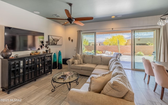 13274 Humphreys Peak Dr, Oro Valley, AZ 85755 - living area with a ceiling fan and visible vents