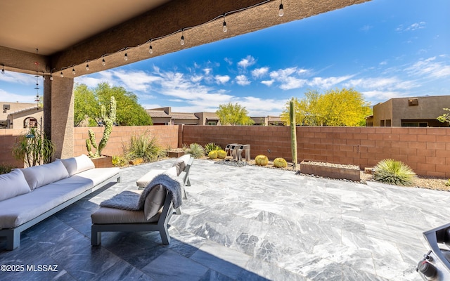 13274 Humphreys Peak Dr, Oro Valley, AZ 85755 - view of patio featuring an outdoor hangout area and a fenced backyard
