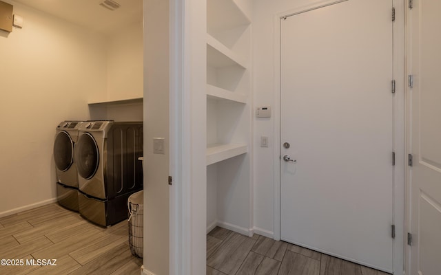 13274 Humphreys Peak Dr, Oro Valley, AZ 85755 - laundry room featuring washing machine and dryer, laundry area, visible vents, light wood-style flooring, and baseboards