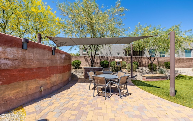 13274 Humphreys Peak Dr, Oro Valley, AZ 85755 - view of patio with outdoor dining area and a fenced backyard
