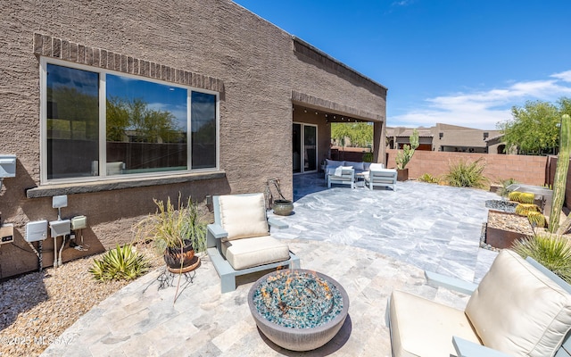 13274 Humphreys Peak Dr, Oro Valley, AZ 85755 - view of patio featuring an outdoor living space and fence