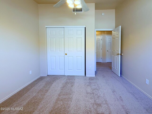 2582 W Brandy Crest Dr, Tucson, AZ 85713 - unfurnished bedroom with carpet, baseboards, and a closet
