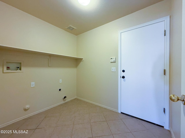 2582 W Brandy Crest Dr, Tucson, AZ 85713 - washroom featuring electric dryer hookup, washer hookup, light tile patterned floors, and baseboards