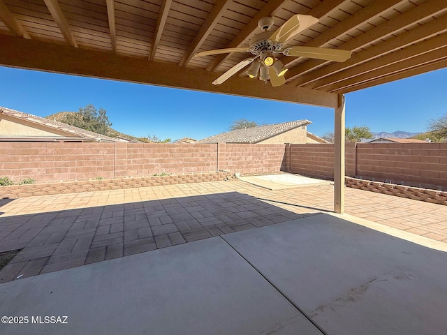 2582 W Brandy Crest Dr, Tucson, AZ 85713 - fenced backyard featuring a patio and ceiling fan