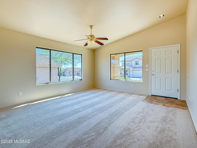 2582 W Brandy Crest Dr, Tucson, AZ 85713 - carpeted spare room featuring lofted ceiling, ceiling fan, and baseboards