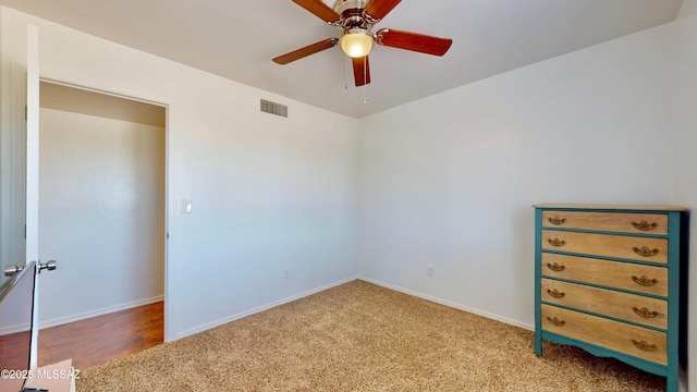 502 N Citadel Ave, Tucson, AZ 85748 - unfurnished bedroom featuring carpet floors, visible vents, baseboards, and ceiling fan
