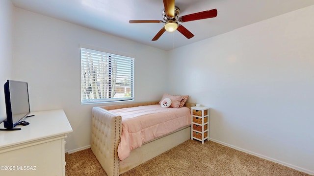502 N Citadel Ave, Tucson, AZ 85748 - bedroom with light colored carpet, ceiling fan, and baseboards