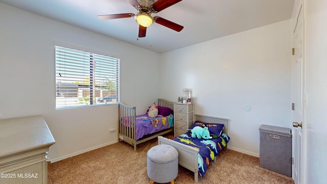 502 N Citadel Ave, Tucson, AZ 85748 - carpeted bedroom featuring baseboards and a ceiling fan