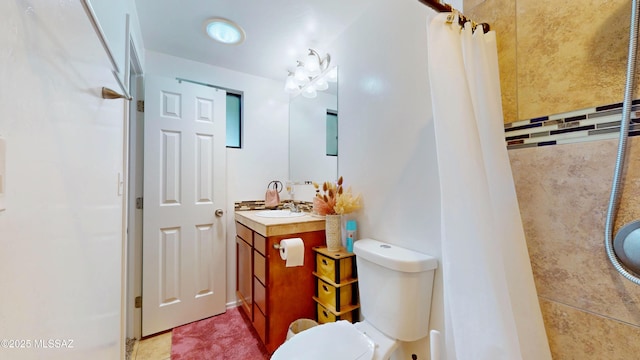 502 N Citadel Ave, Tucson, AZ 85748 - bathroom featuring vanity, a shower with shower curtain, and toilet