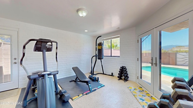 502 N Citadel Ave, Tucson, AZ 85748 - workout area featuring brick wall and french doors