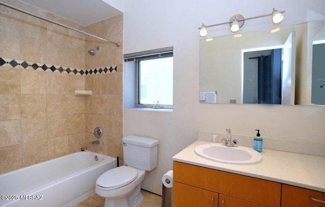 full bath with vanity, toilet, and  shower combination