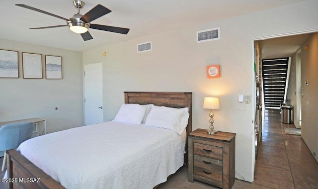 bedroom featuring visible vents and ceiling fan