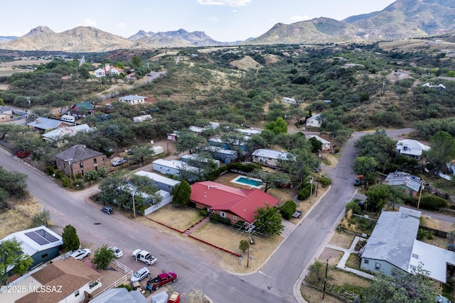 drone / aerial view featuring a mountain view and a residential view
