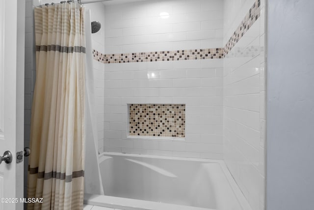 bathroom with shower / tub combo