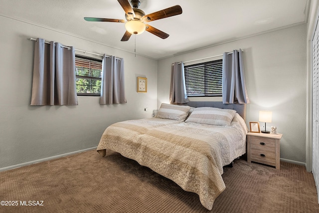bedroom featuring baseboards, a ceiling fan, and carpet flooring