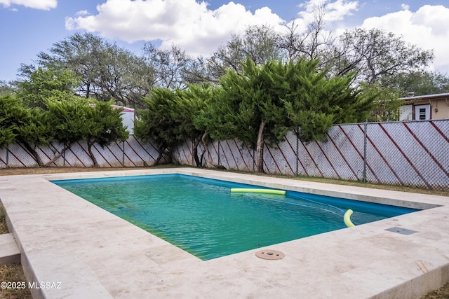 view of pool with a fenced backyard, a fenced in pool, and a patio