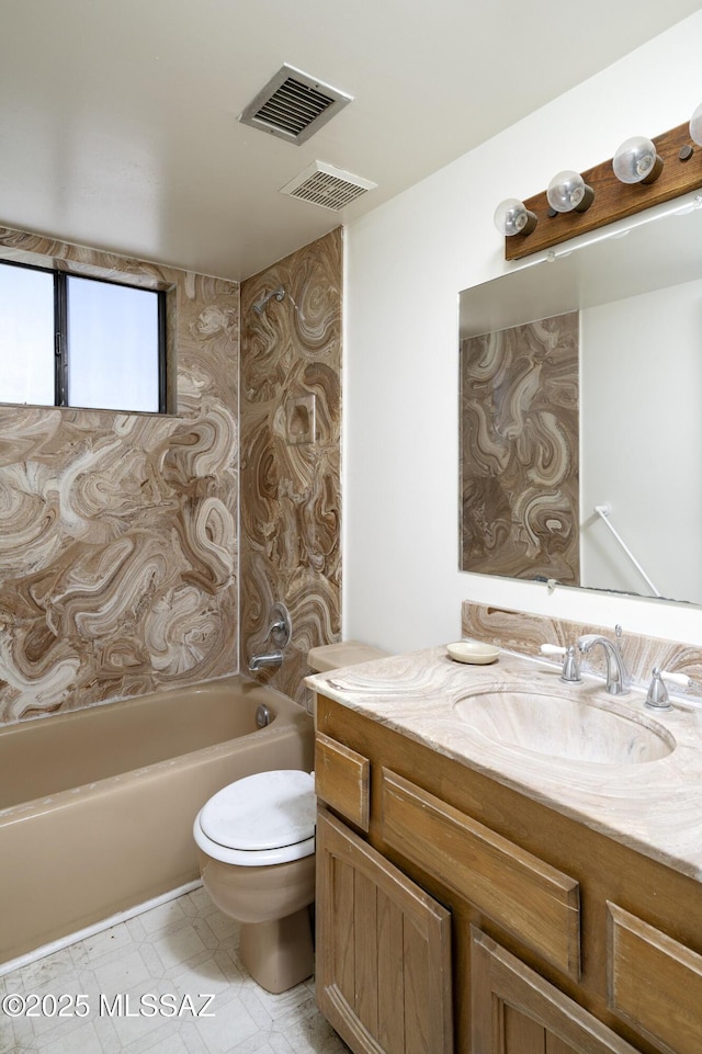 601 N Sahuara Ave, Tucson, AZ 85711 - full bath featuring vanity, toilet, bathing tub / shower combination, and visible vents