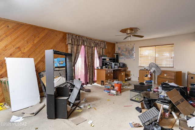 601 N Sahuara Ave, Tucson, AZ 85711 - interior space with wood walls and ceiling fan