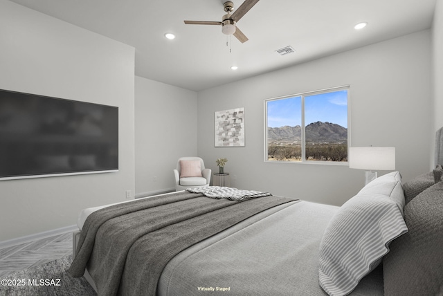 bedroom featuring recessed lighting, a mountain view, visible vents, and a ceiling fan