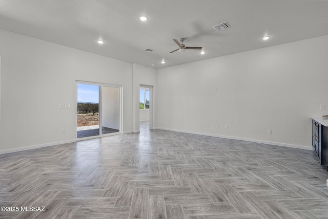 spare room with baseboards, a ceiling fan, visible vents, and recessed lighting