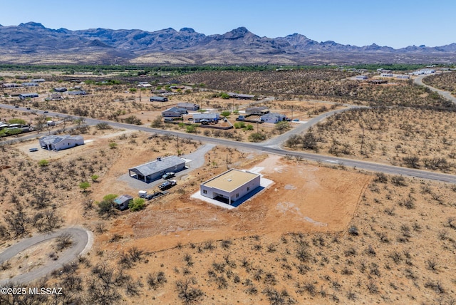 bird's eye view with a rural view, a desert view, and a mountain view