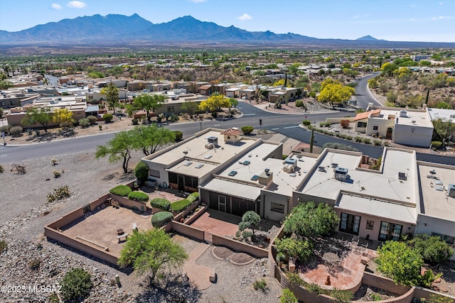 birds eye view of property with a residential view and a mountain view