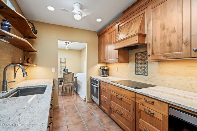 kitchen with open shelves, a sink, stainless steel oven, black electric stovetop, and backsplash