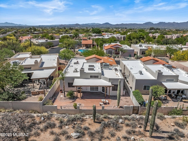 drone / aerial view with a mountain view and a residential view