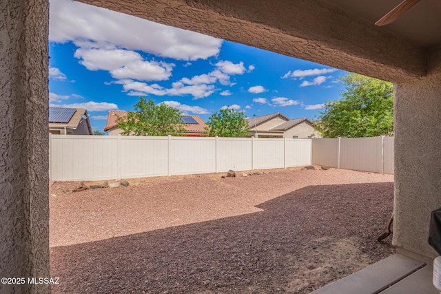 view of yard with a fenced backyard