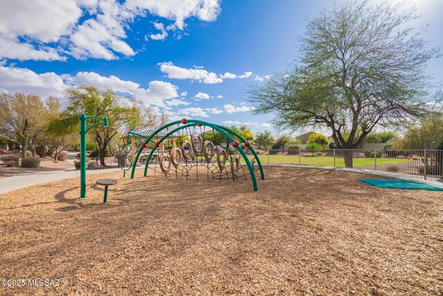 community jungle gym with fence
