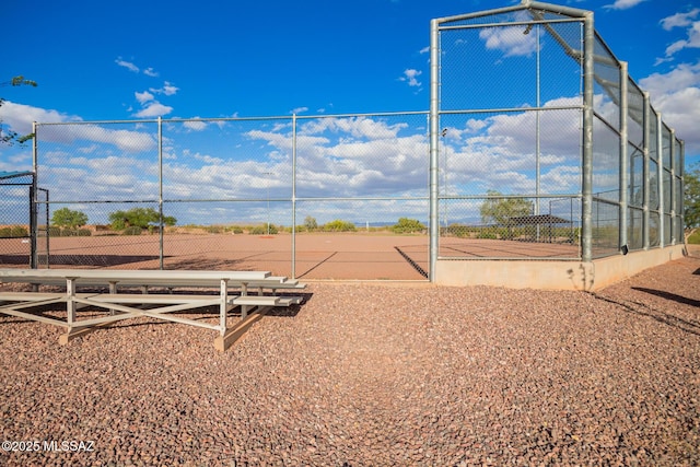 view of community with fence