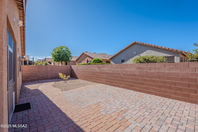 view of patio with a fenced backyard