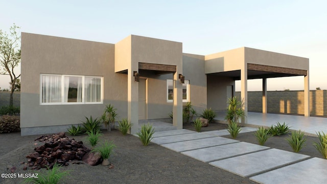 contemporary house with stucco siding