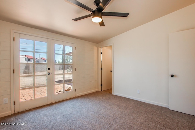 interior space with baseboards, french doors, carpet flooring, and ceiling fan