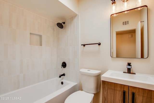 bathroom featuring toilet, vanity, washtub / shower combination, and visible vents