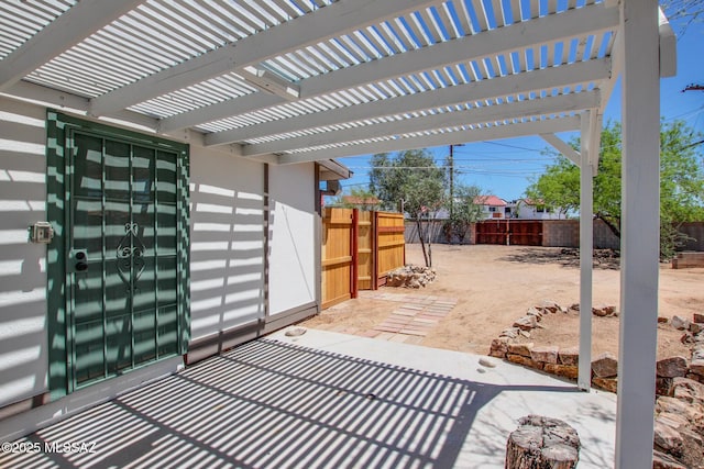 view of patio featuring a pergola and a fenced backyard