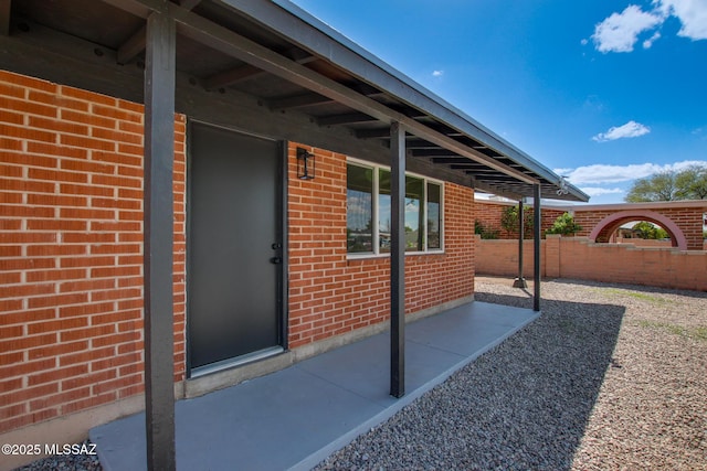 view of patio / terrace with fence